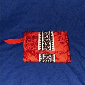 Red trifold quilted wallet